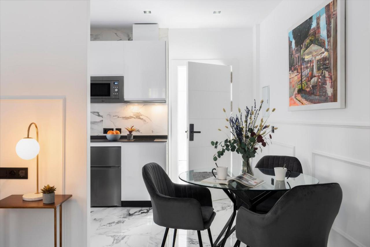 Quivir Apartamentos Deluxe Casa Del Arco 安度亚尔 外观 照片