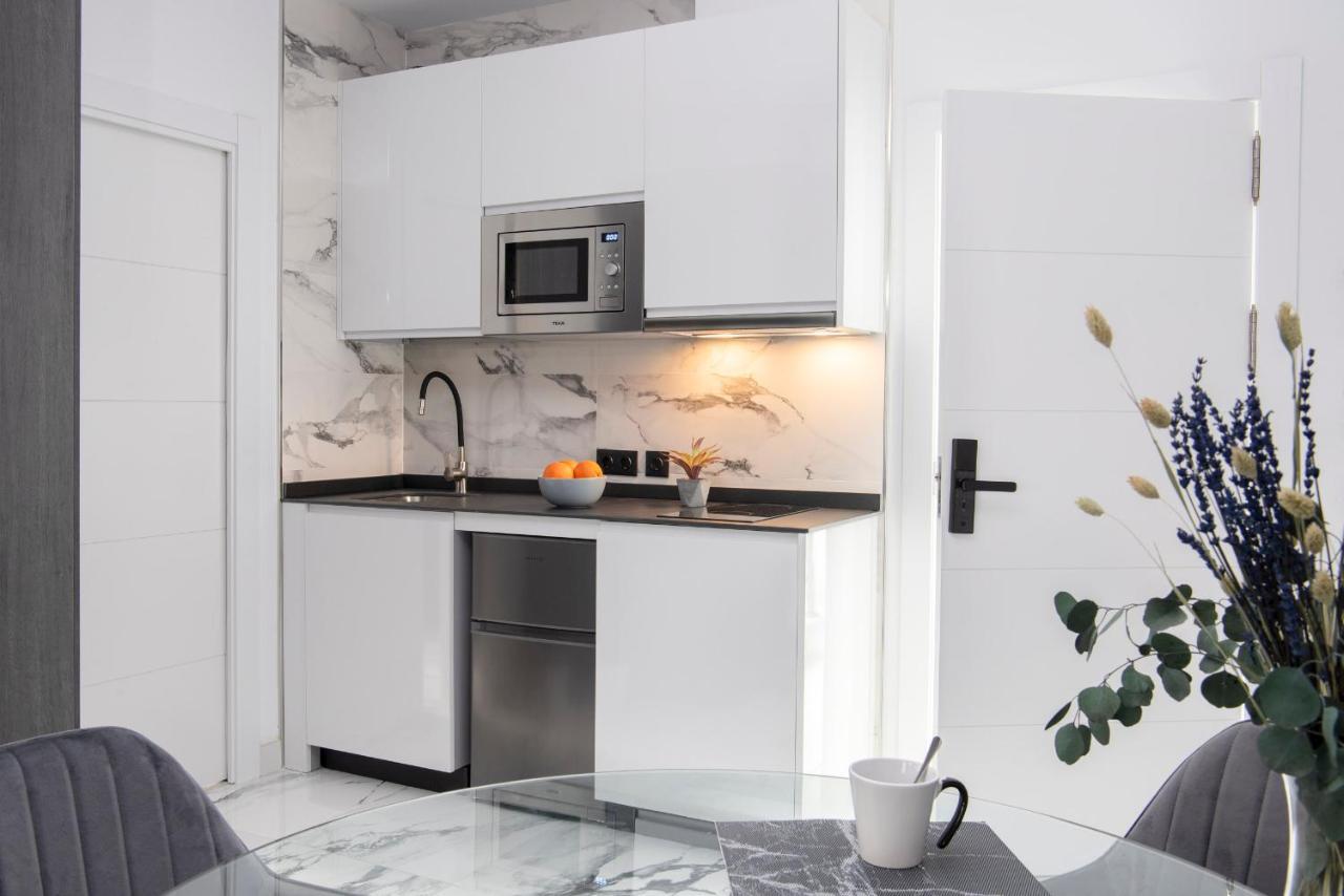 Quivir Apartamentos Deluxe Casa Del Arco 安度亚尔 外观 照片